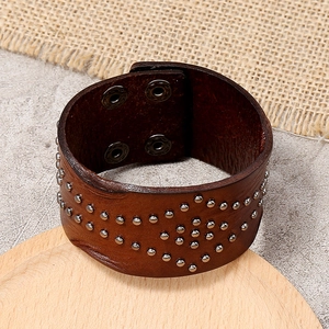 Retro brown wide leather bracelet with metal rivets and adjustable snap buttons for men