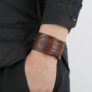 Men's retro brown leather cuff bracelet featuring vintage metal stud geometric pattern