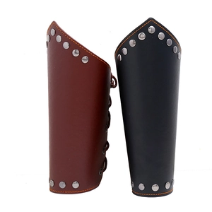 Detail of punk leather arm guards with metal rivets and adjustable side lacing