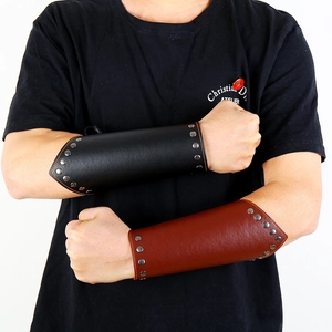 Punk style faux leather wrist guard with metal rivets in black and brown finishes