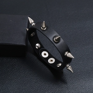 Punk black leather bracelet with silver metal spikes and adjustable double buckle