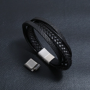 Multi-layer black leather bracelet with braided strands and brushed steel magnetic clasp