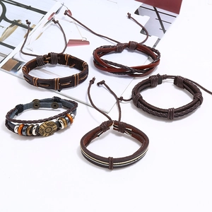 Five-piece set of retro braided leather bracelets with metal charms and wooden beads