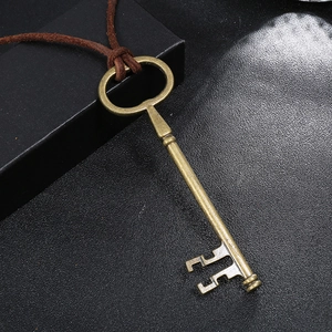 Retro bronze key pendant necklace with dark brown braided rope on black leather