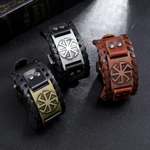 Three Nordic Kolovrat sun wheel symbols on vintage braided leather punk bracelets for men