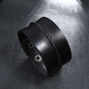 Men's vintage black wide leather punk bracelet with center stitching and metal snaps
