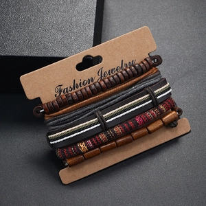 Five-piece bohemian woven bracelet set with wooden beads and leather on kraft card
