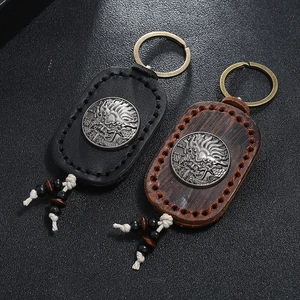 Handcrafted punk style leather keychains with vintage dragon metal embossments