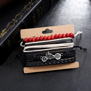 Vintage braided leather bracelet set for men with a silver motorcycle alloy charm