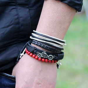 Vintage 4-piece multilayer leather bracelet set with motorcycle charm and red wood beads