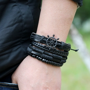 Multi-layer black leather bracelet set for men featuring a nautical rudder charm