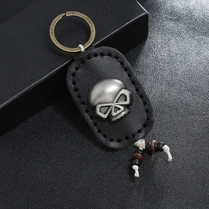 Retro Punk Schlüsselanhänger aus schwarzem Leder mit Totenkopf und Perlen