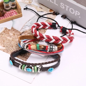 Three-piece bohemian vintage leather bracelet set with woven ropes and blue gemstone detail