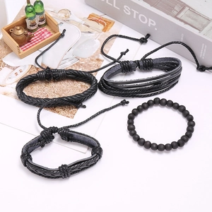 Set of four men's vintage black woven leather bracelets with matte beads and cords