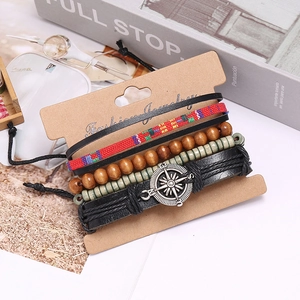 Handmade multilayer leather bracelet set with wooden beads and compass charm on card
