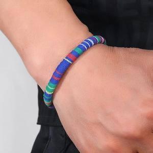 Bohemian hand-woven rainbow stripe bracelet with ethnic navy blue cord for women