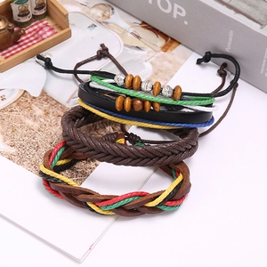 Three-piece bohemian set of braided leather bracelets with colorful beads and cords