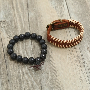 Retro distressed leather bracelet set with matte black beads and bronze buckle