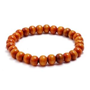 Pulsera minimalista de cuentas de madera hecha a mano con veta de madera natural marrón