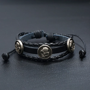 Black multilayer leather bracelet with retro skull metal charms and adjustable cord