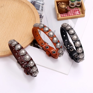 Punk leather bracelets with silver rivets in dark brown, tan, and black leather styles
