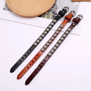 Punk vintage leather bracelets set with metal rivets and adjustable buckles in three colors