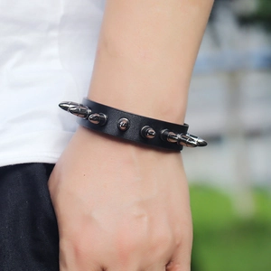 Men's punk black leather bracelet featuring silver spike studs for a rock jewelry look