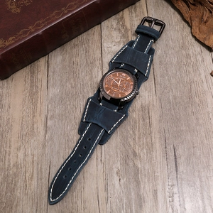 Retro wide leather cuff watch for men with bronze dial and blue hand-stitched strap