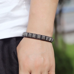 Retro punk style black leather bracelet with embossed silver square metal studs for men