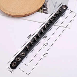 Punk black leather bracelet with dark metal spikes and adjustable snap closure studs