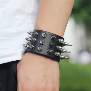 Punk wide leather bracelet with triple row silver metal spikes for a rock fashion style