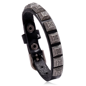 Punk black leather bracelet with vintage silver flower rivets and buckle closure