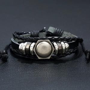 Multilayer leather bracelet with silver hexagonal charm and adjustable black wax cord