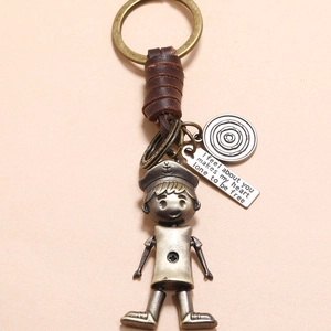 Vintage bronze robot keychain with hand-woven leather and anchor charm details