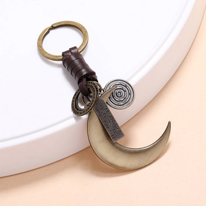 Vintage crescent moon leather keychain with bronze pendant and sentimental engraved tag