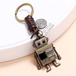 Retro bronze robot keychain with leather wrap, creative bag pendant for women and girls
