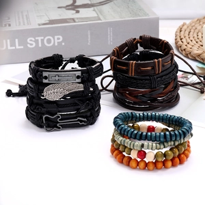 Retro multi-piece braided leather bracelet set with wooden beads and metal charms