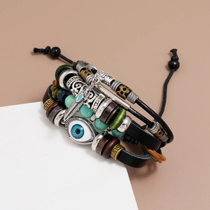 Multilayer leather bracelet with blue evil eye bead and silver feather pendant charm