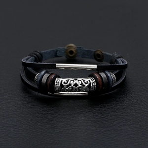 Retro multi-layer woven leather bracelet featuring vintage metal tubes and dark beads