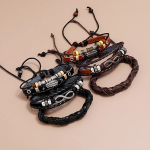 Retro multi-layer braided leather bracelet set with infinity symbol and metal feather charms