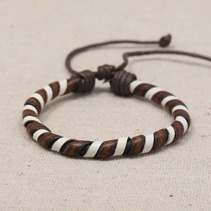 Handmade woven brown and white leather bracelet with adjustable drawstrings for women