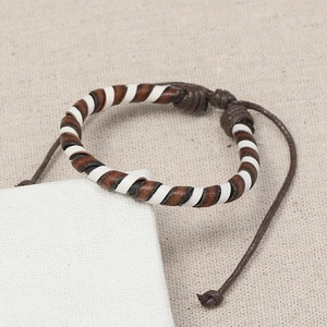 Handmade retro brown woven leather bracelet with adjustable minimalist wrap design