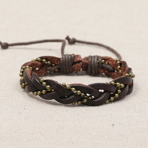 Handmade woven brown leather bracelet with vintage bronze beads and adjustable knot