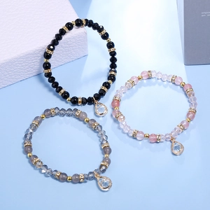 Three-piece colorful beaded crystal bracelet set with crystal drops and elastic cord