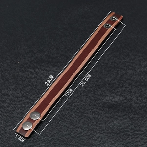 Vintage lederen armband met verstelbare drukknoppen en afmetingen van de totale lengte