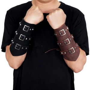 Detail of punk leather arm guards with adjustable straps and silver metal buckles