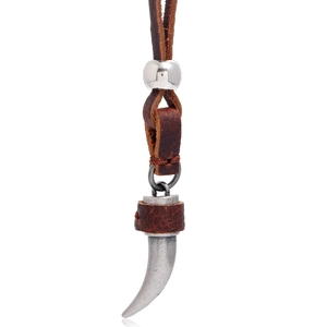 Retro leather necklace featuring a polished silver bead and a rugged wolf tooth pendant