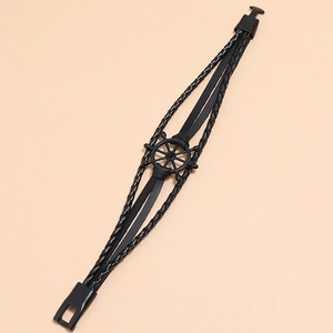Men's multi-layer black braided leather bracelet featuring a nautical helm charm design