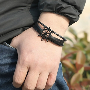 Men's punk braided leather bracelet with black nautical ship wheel charm and layered bands