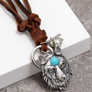 Vintage wolf head pendant necklace with turquoise inlay on brown leather cord
